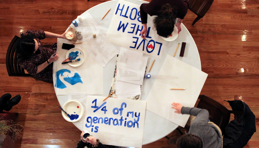 Overhead view: students paint signs for the then-upcoming VT March for Life