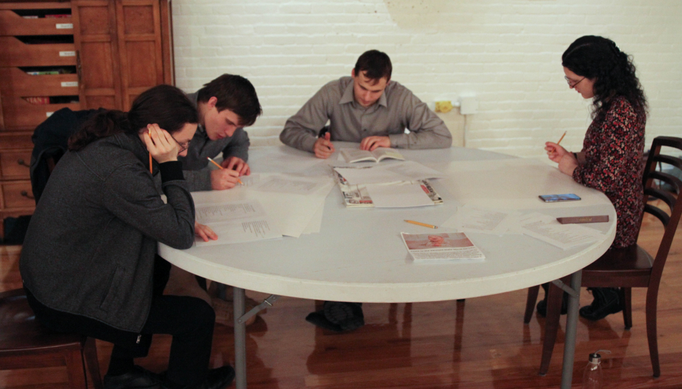 Four studying at a table