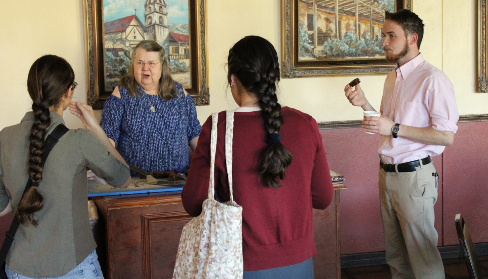 Mrs. O'Flynn chats with students