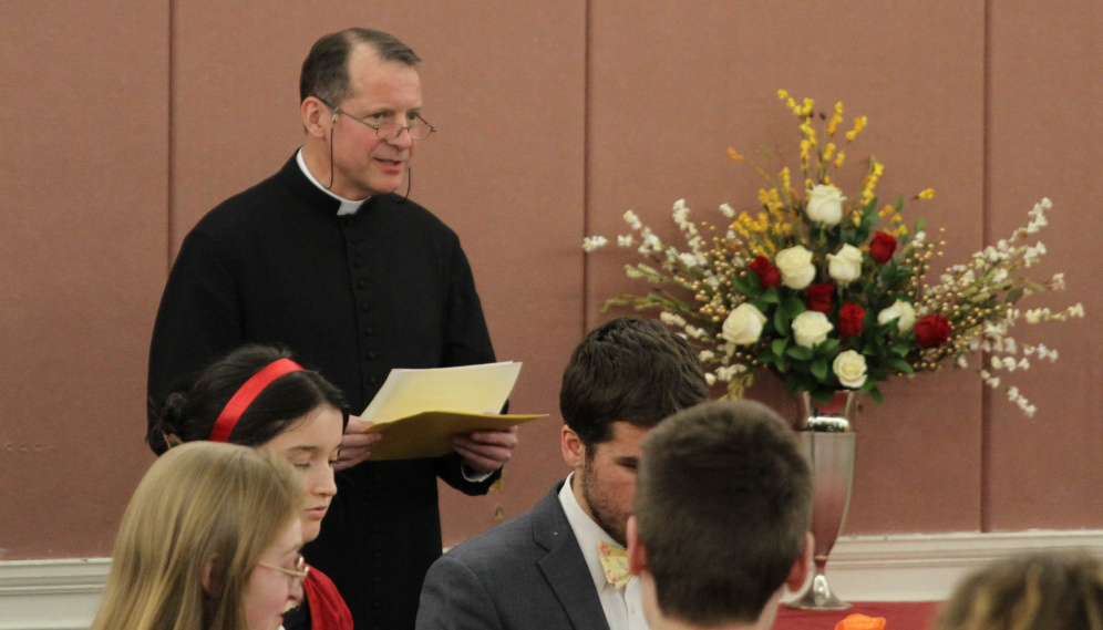 Fr. Markey leads the students in prayer