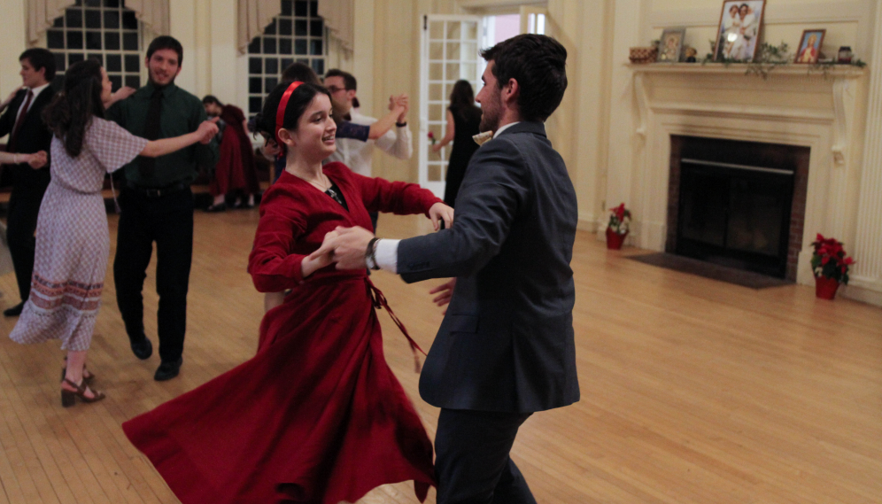 Students dance in the foyer of Gould