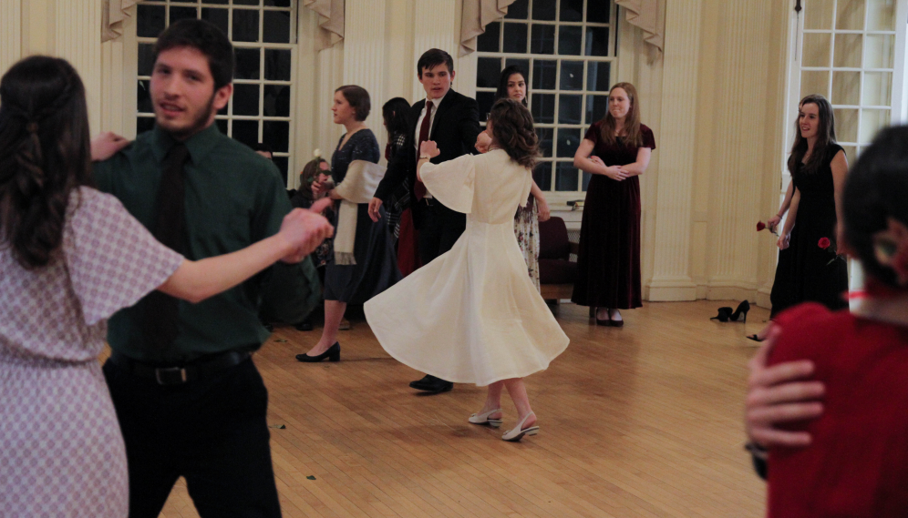 Students dance in the foyer of Gould