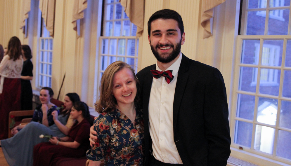 A couple poses for a photo