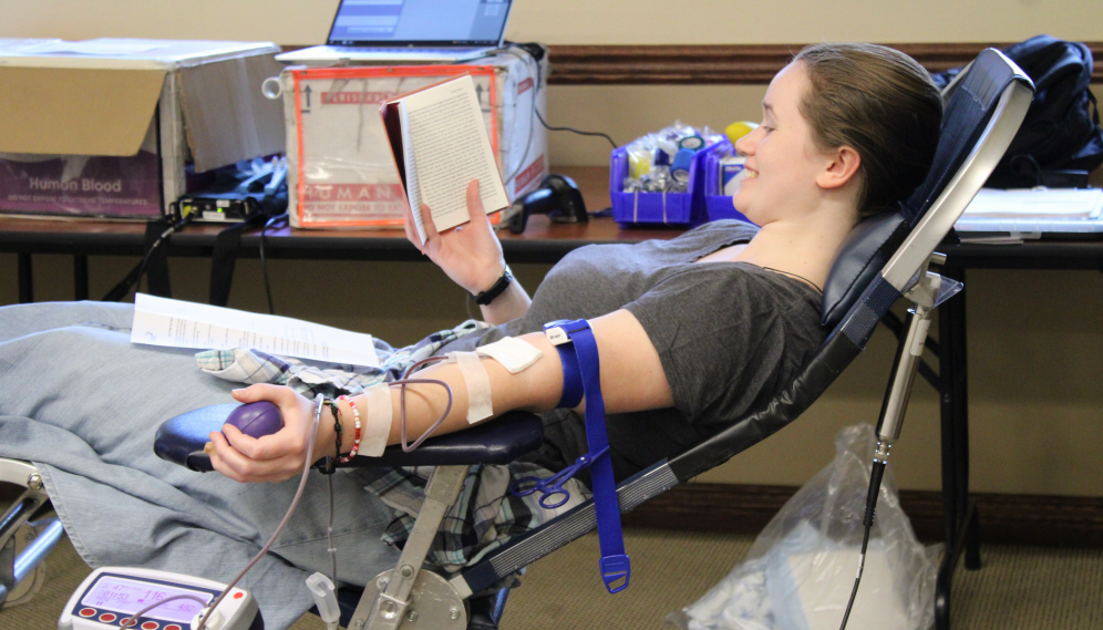 A student gets their blood drawn