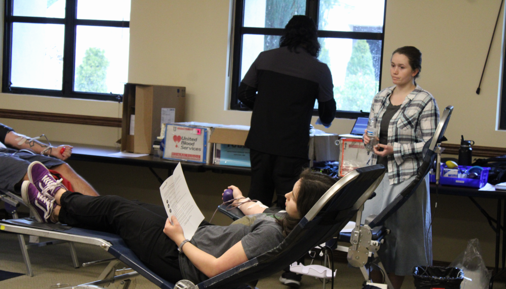 A student gets their blood drawn