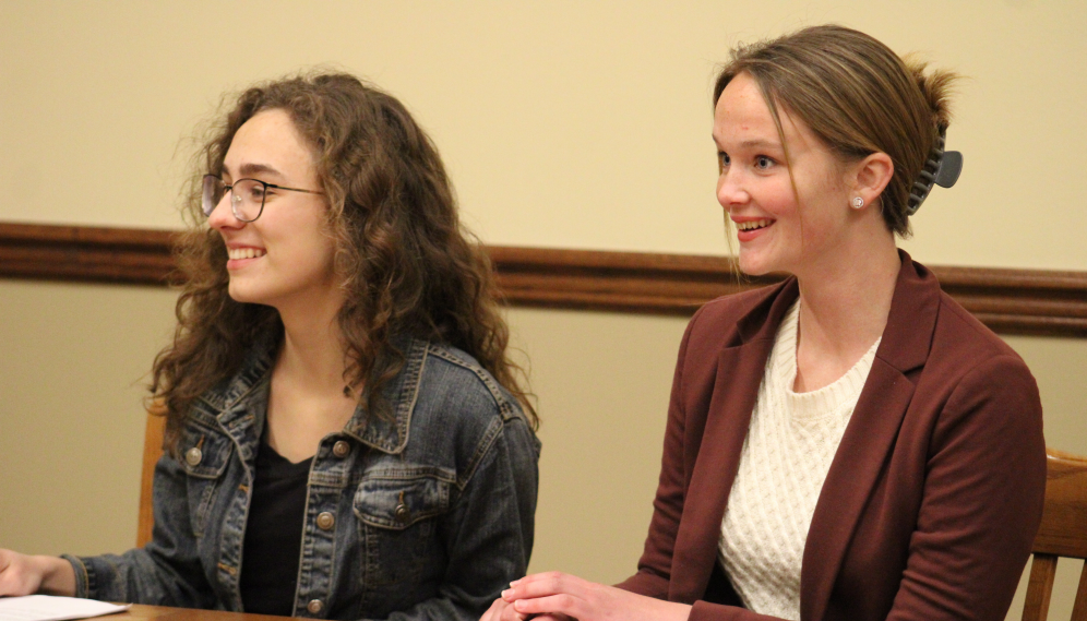 A pair of students at the table