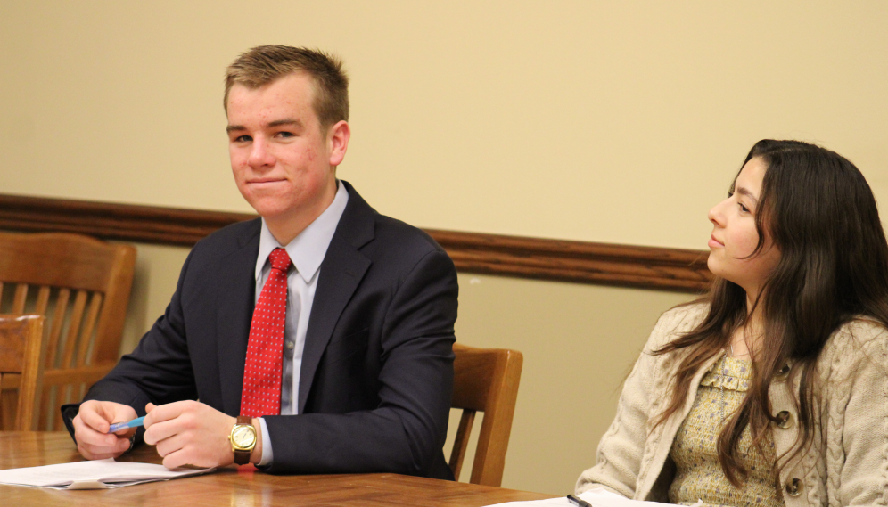 A pair of students at the table