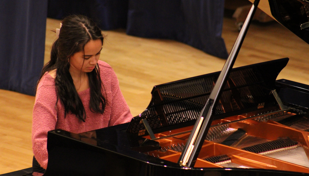 A student plays the piano