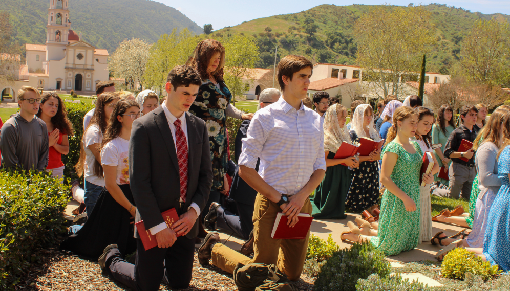 The congregation kneels