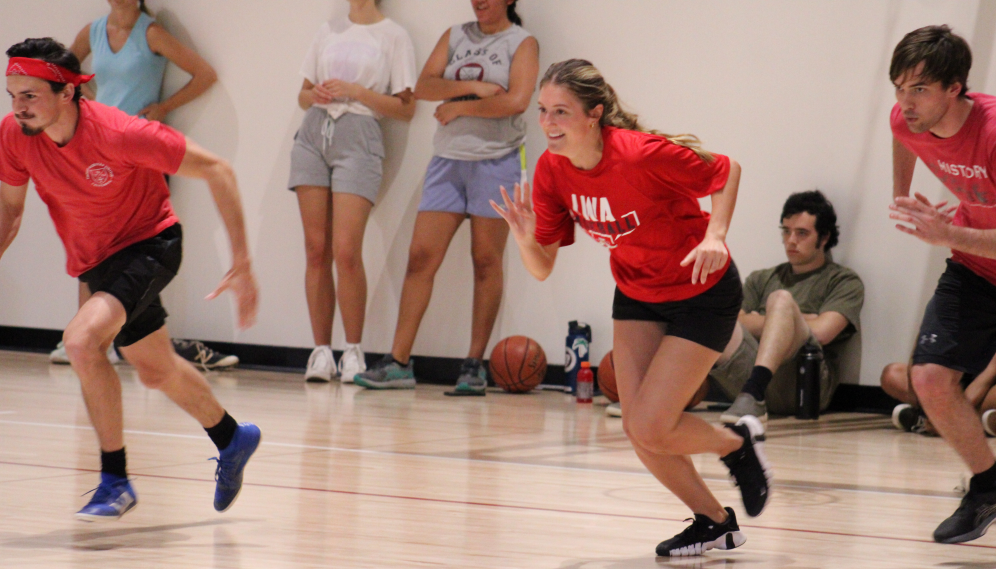 Indoor dodgeball: racing from the gym wall to grab ammunition