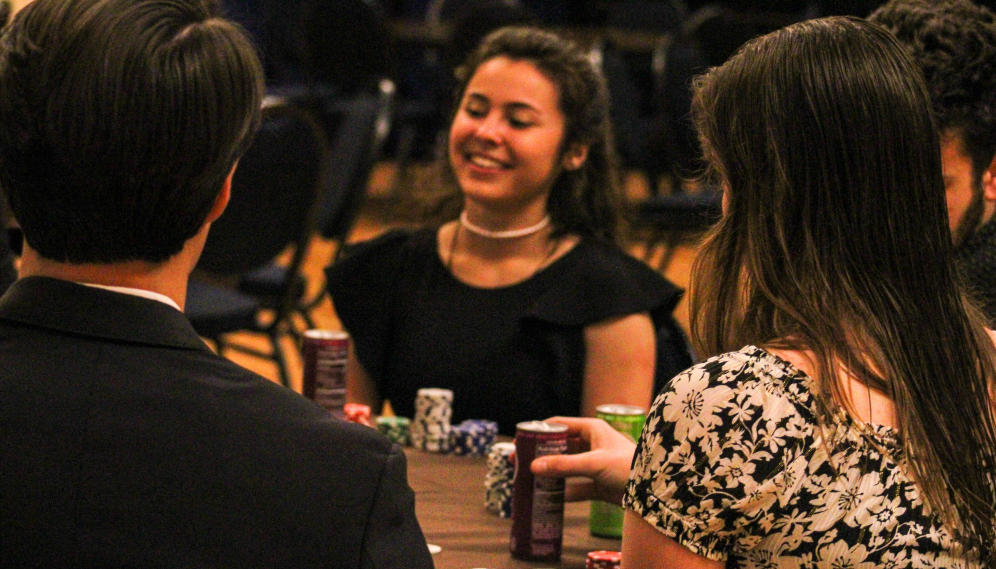 Poker players at one of the tables