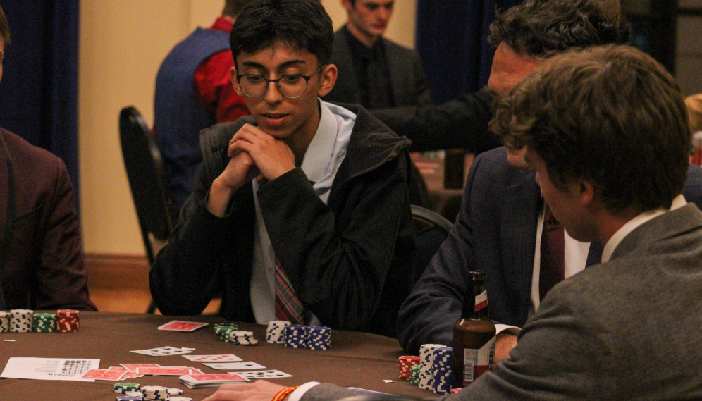 Poker players at one of the tables