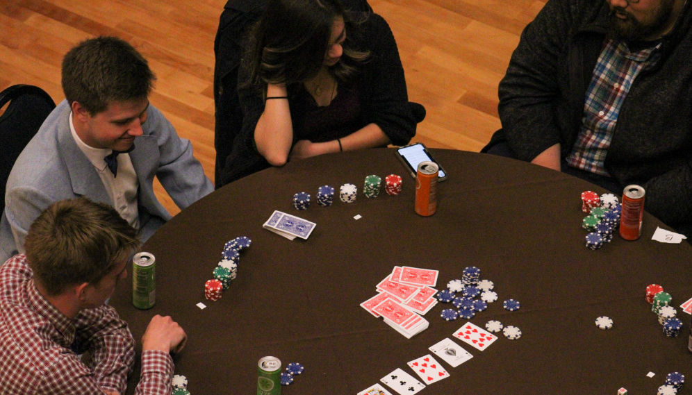 Poker players at one of the tables