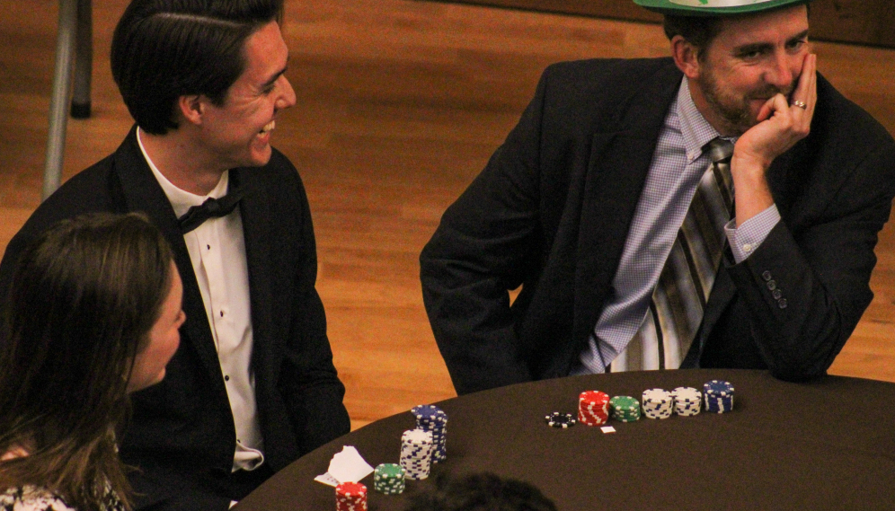 Players chuckle at a move made by Dr. Cooper