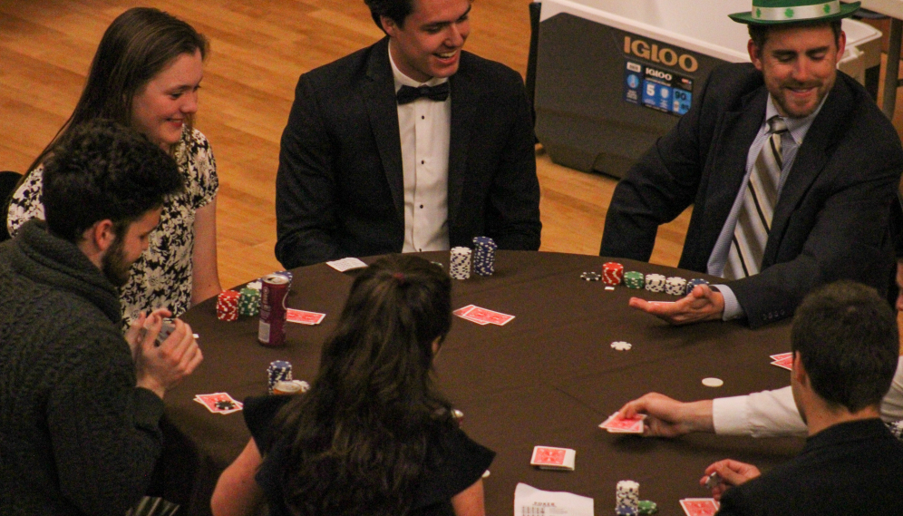 Poker players at one of the tables