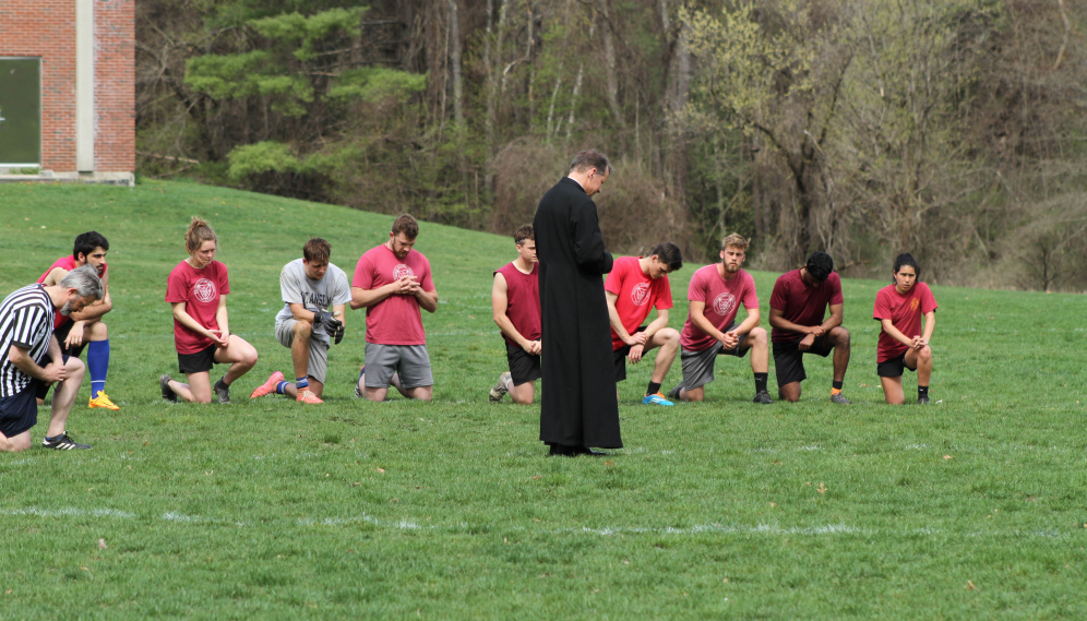 Fr. Markey leads the students in prayer
