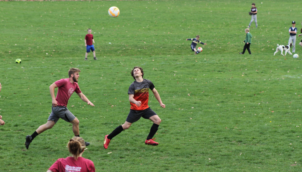 Students in pursuit of the ball