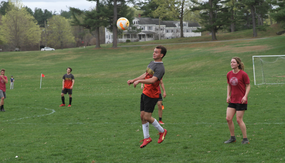 A TMC student about to head the ball