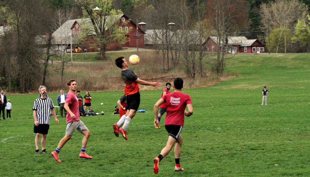 A student heads the ball