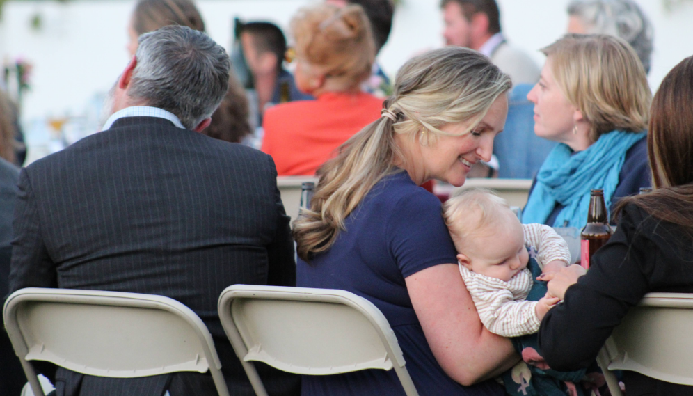 An alumna with her baby