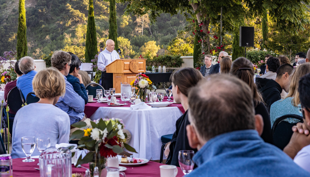 Dr. Augros addresses the assembly at dinner