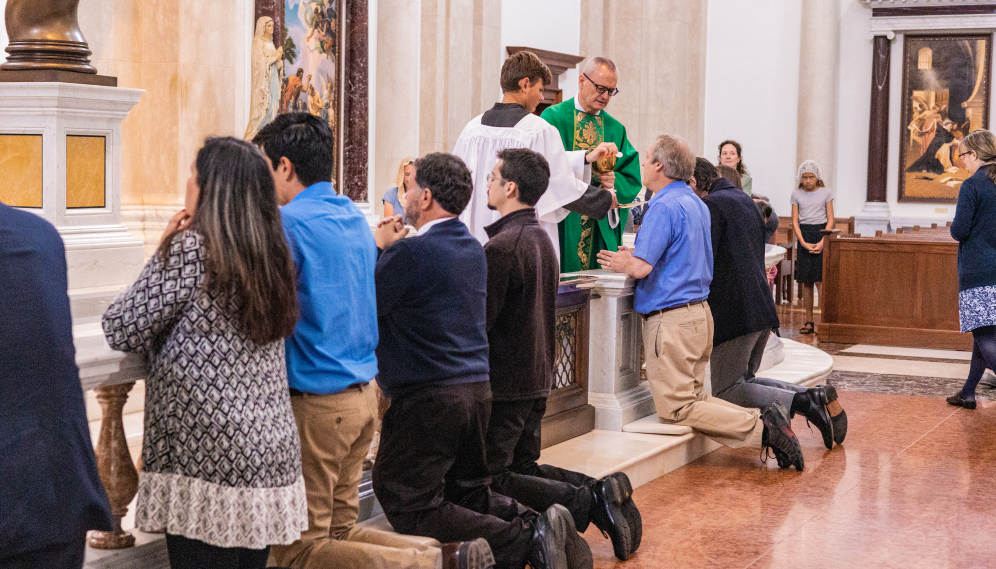 Attendees at the altar rail