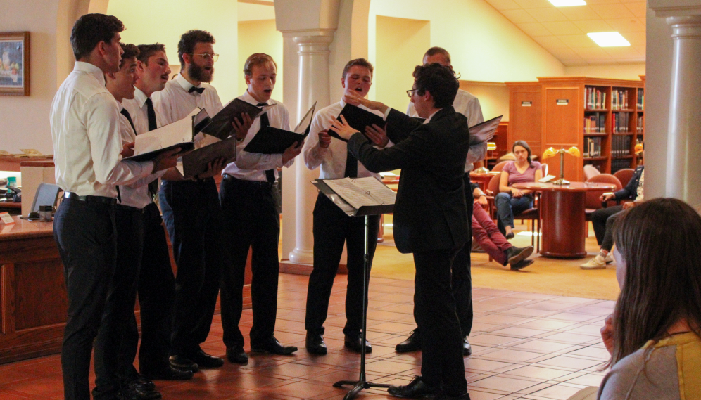 Long shot of a part of the choir performing