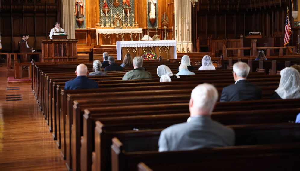 Friends of the college go to mass