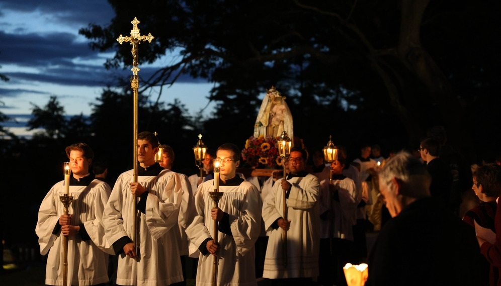 The procession starts down the hill