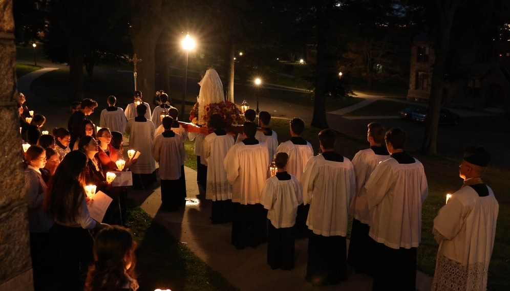 The procession starts down the hill