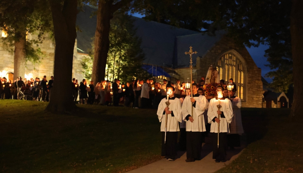 The procession starts down the hill