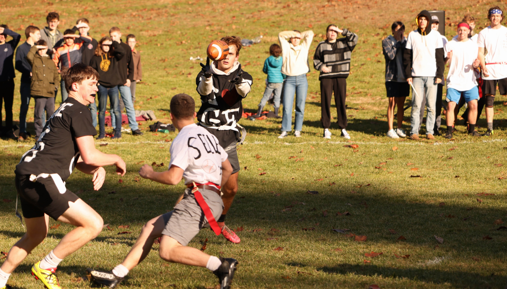 Sam Peterson ('25) passes the ball to Martin O'Hare ('25)