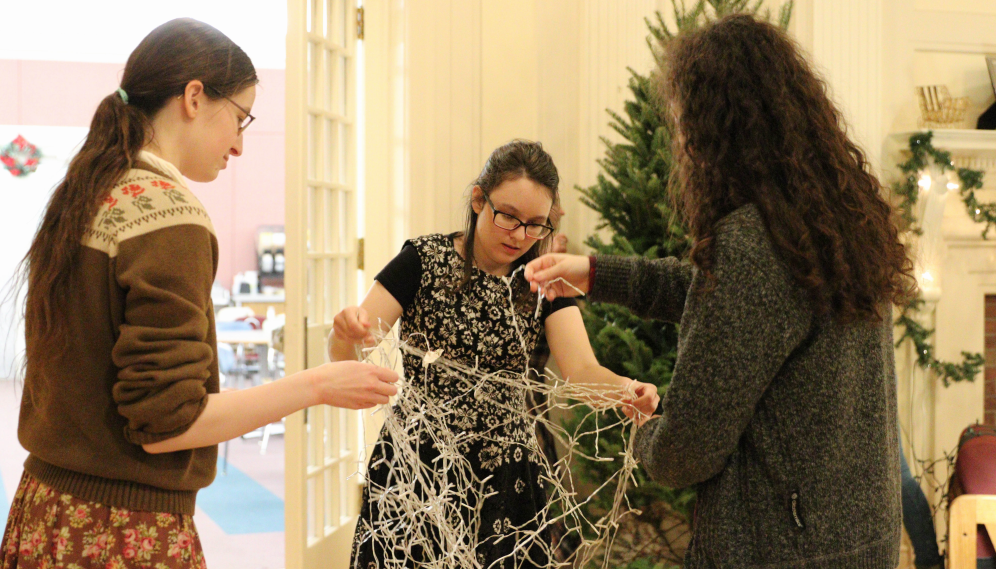 The ladies decorate their tree