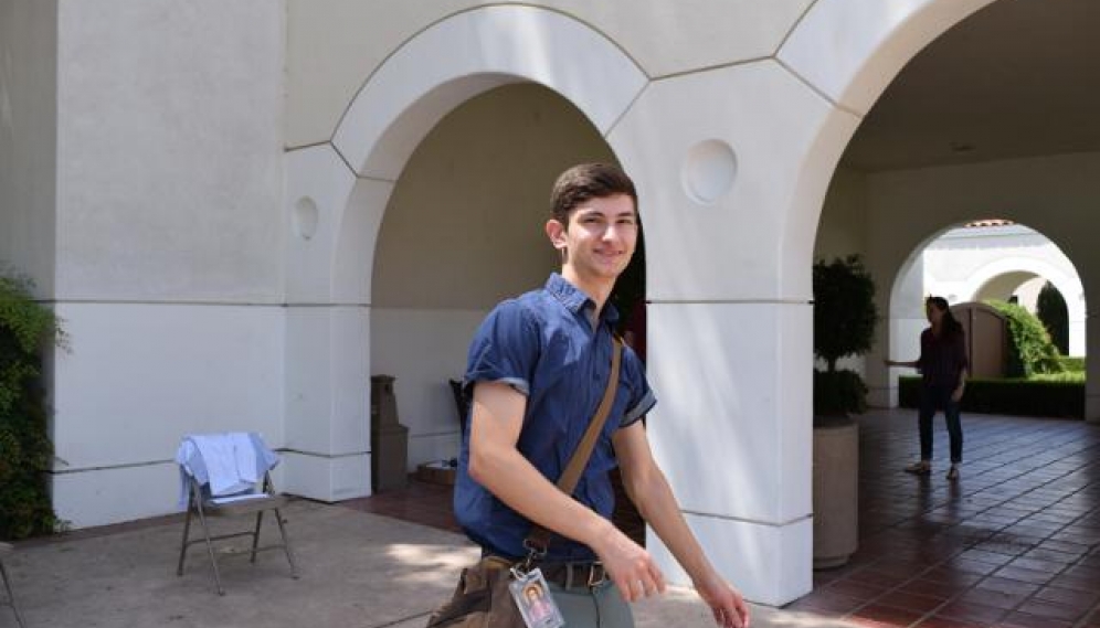 Students get their ID photos and submit t-shirt sizes (High 