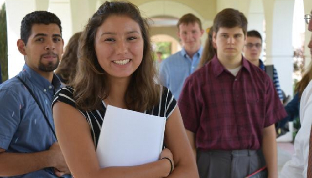 Students get their ID photos and submit t-shirt sizes (High 