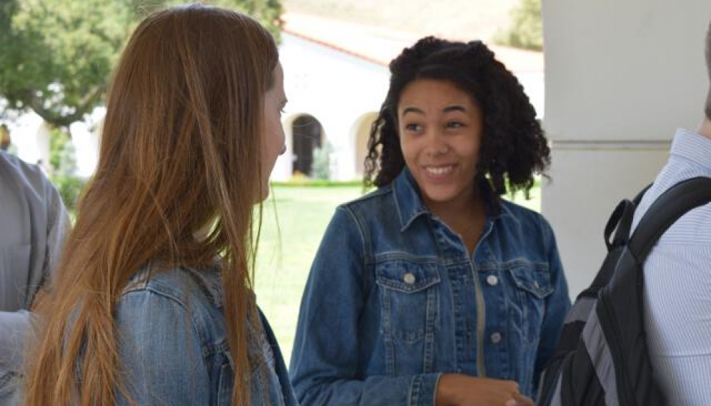 Students get their ID photos and submit t-shirt sizes (High 