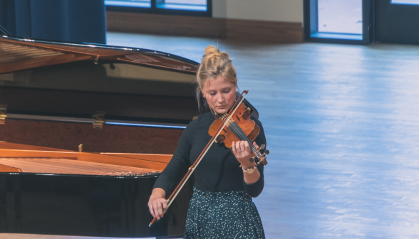 A student plays the violin