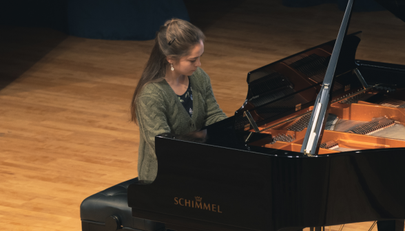 A student plays the piano