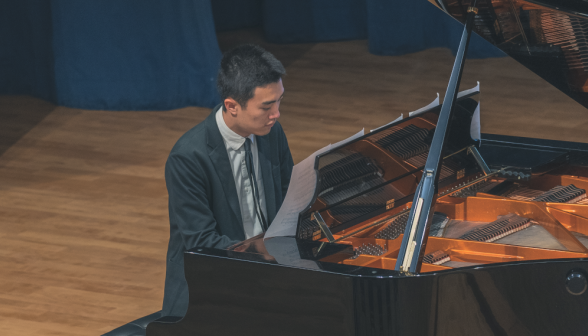 A student plays the piano