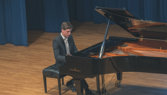 A student plays the piano