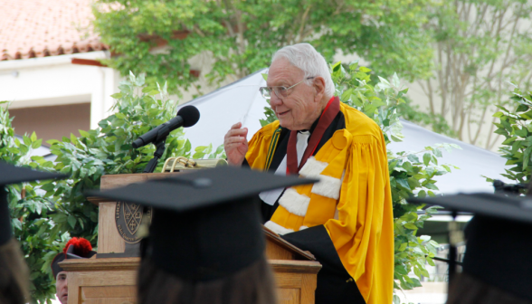 Chaplain Rev. Cornelius M. Buckley, S.J., offers the benediction.