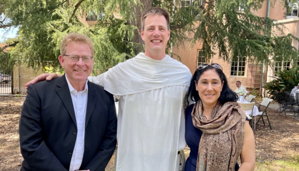 Rev. John Winkowitsch, O.P. (’04), with Dr. and Mrs. Kelly