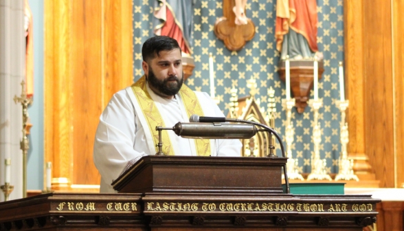 Fr. Rooney leads the prayers in Our Mother of Perpetual Help Chapel