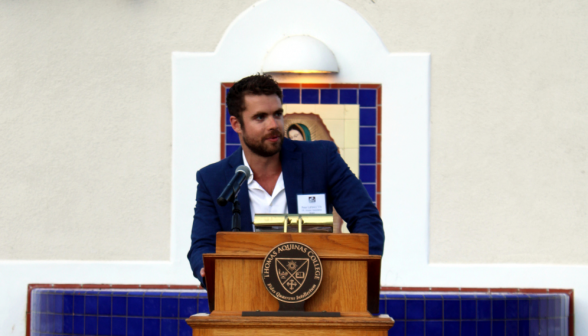 An alumni delivers a speech