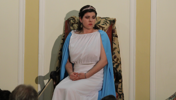 Clotilde Cecchi as Dido, seated on her throne