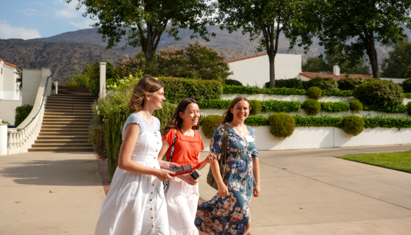 Students walk along academic quadrangle