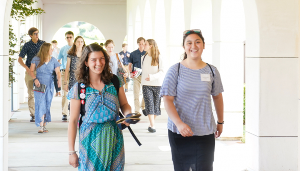 Students walk along academic quadrangle