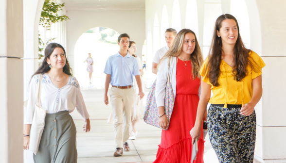 Students walk along academic quadrangle