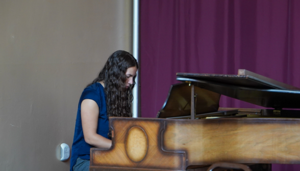 Student plays the piano