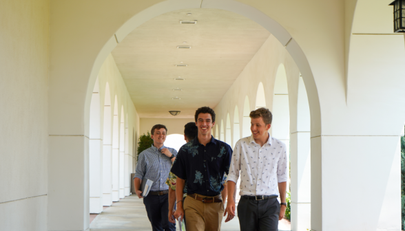 Students walk along academic quadrangle